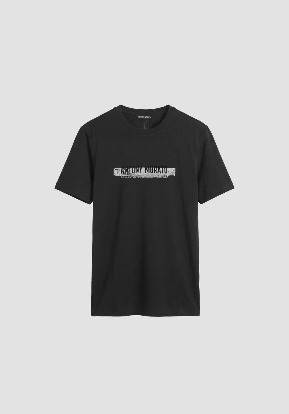 Camiseta negra regular fit en punto jersey de algodón con estampado en el delanter